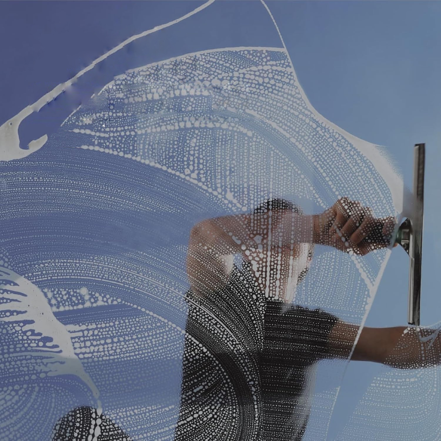 What is a squeegee used for cleaning?